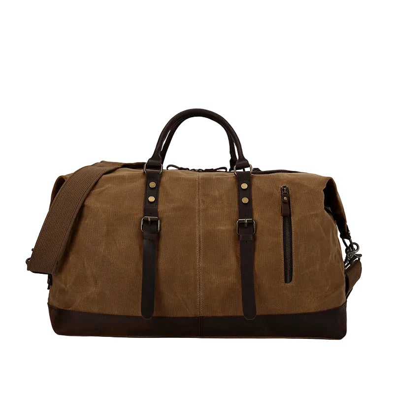 Army green waxed canvas holdall with a crazy horse leather base, showing both materials side by side