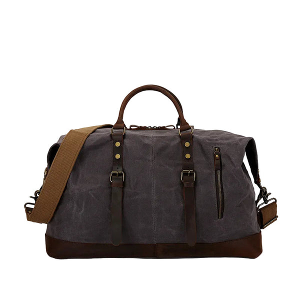 Inside a waxed canvas weekender holdall, showing the main compartment and interior slip pockets