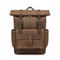 Side view of waxed canvas backpack showing open side pocket