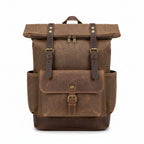 Side view of waxed canvas backpack showing open side pocket
