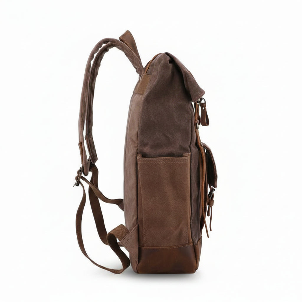 Rear view of canvas backpack with padded adjustable shoulder straps