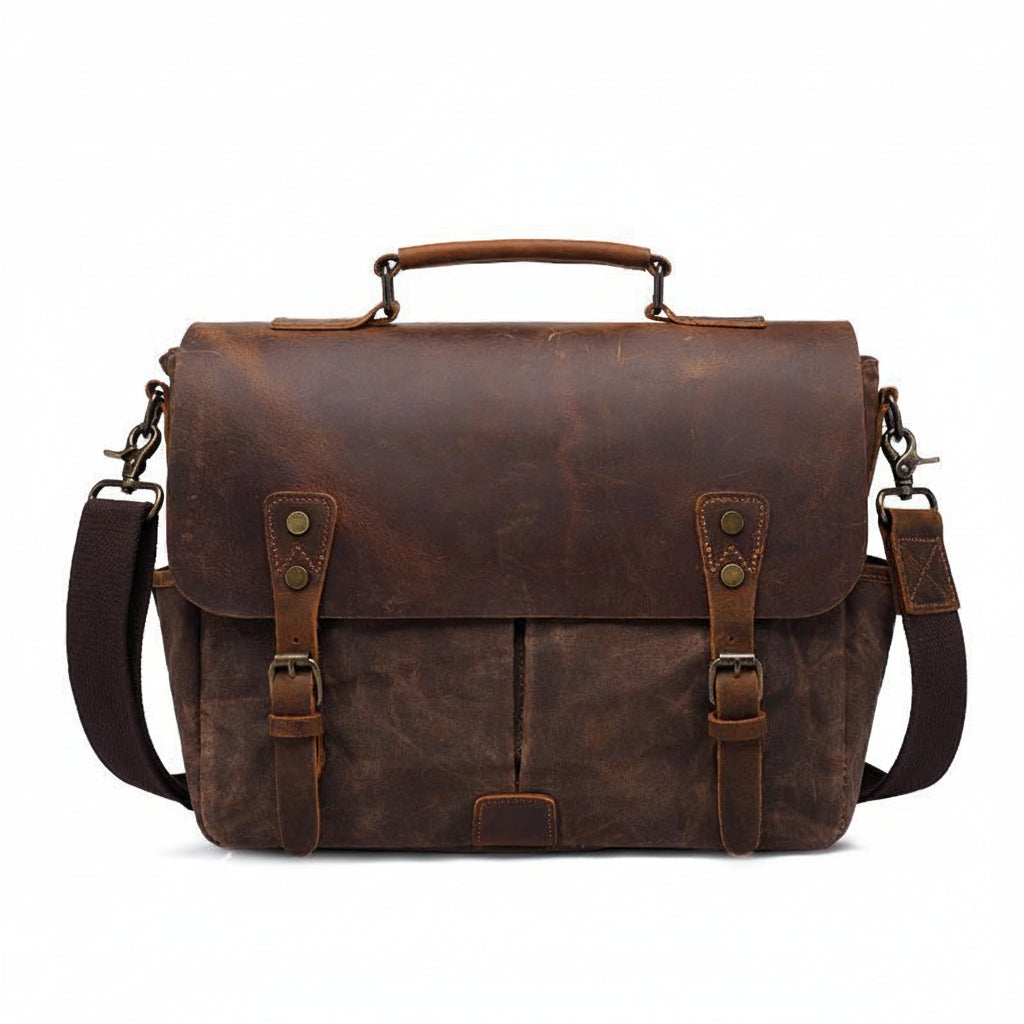 Messenger bag showing leather closure straps and front pockets