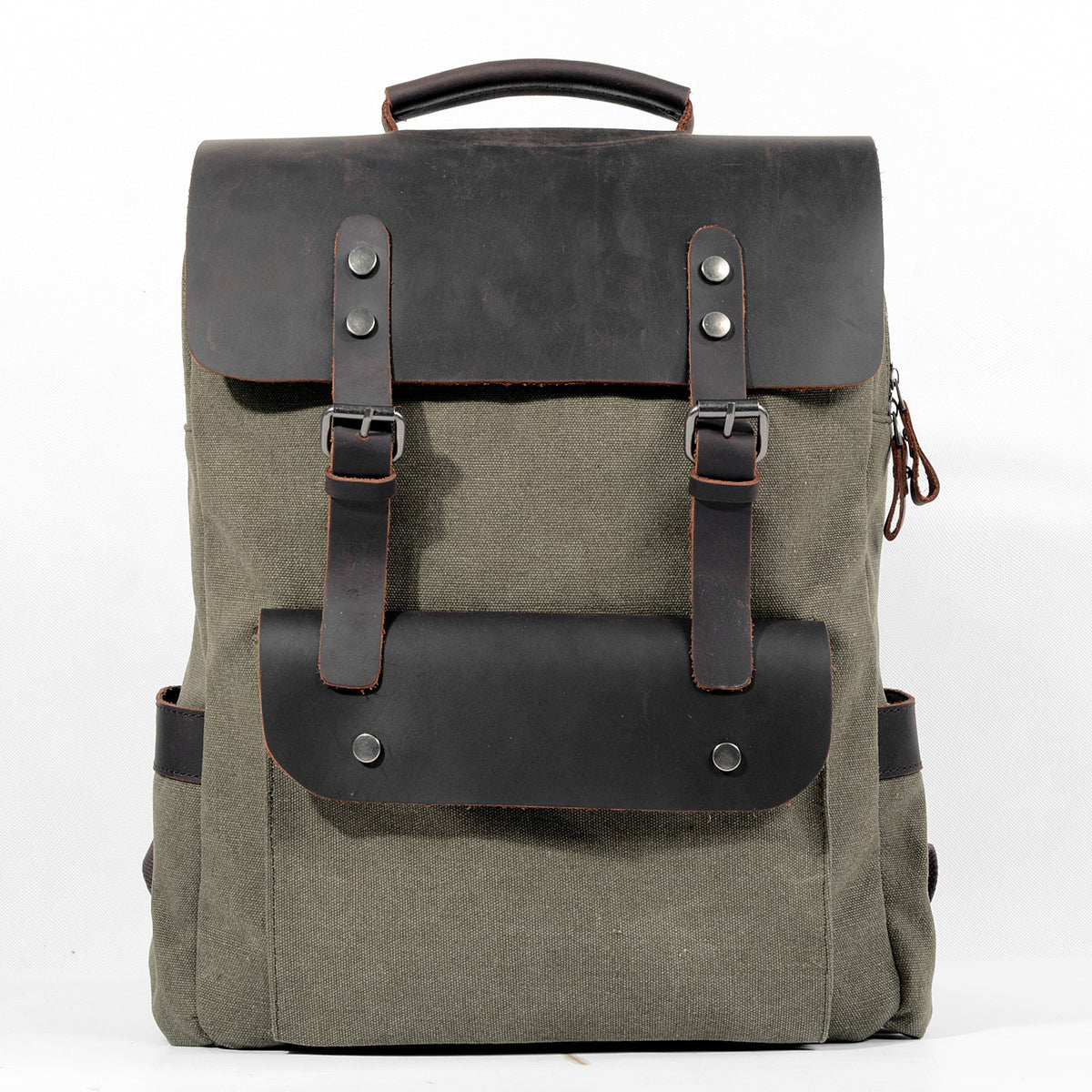 Canvas college backpack worn on the shoulder, showing carry profile