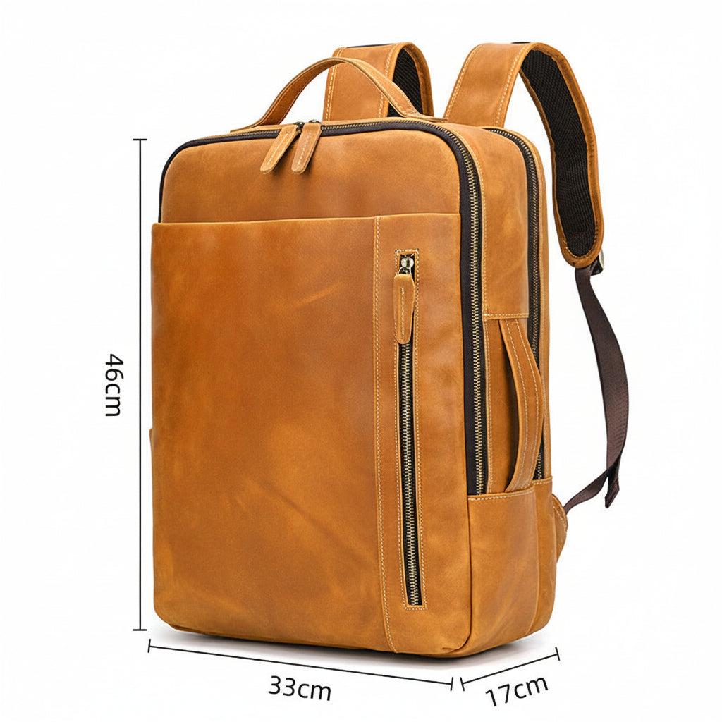 Metropolitan Leather Backpack in tan crazy horse leather with dimension lines showing 33 cm wide, 46 cm high and 17 cm deep