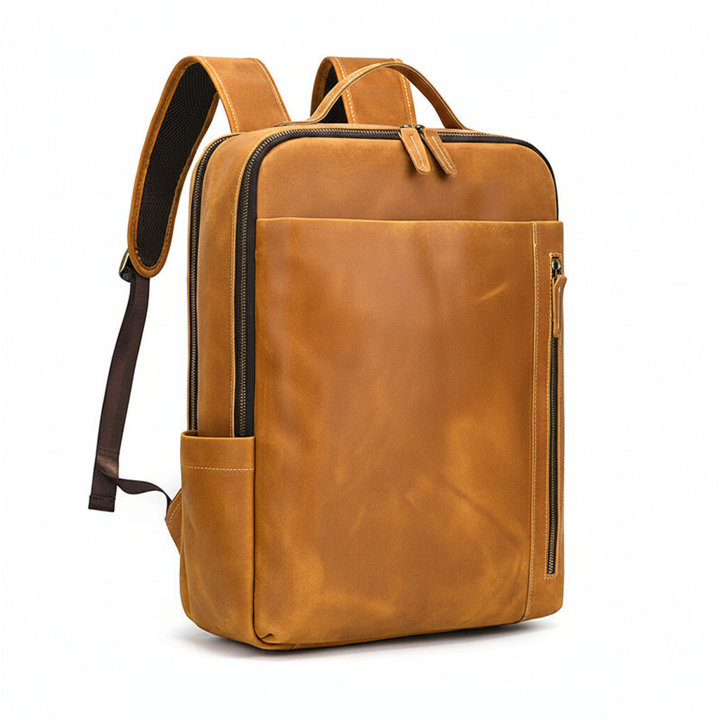 Metropolitan Leather Backpack in tan crazy horse leather, three-quarter view — Khal Gold
