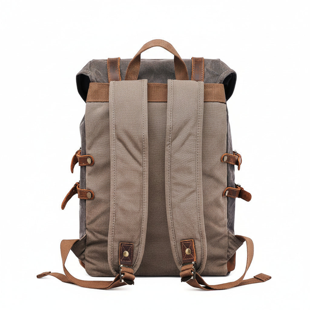 Highland Waxed Canvas Rucksack in brown waxed canvas with leather straps, buckles and trim — Khal Gold