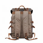 Highland Waxed Canvas Rucksack in brown waxed canvas with leather straps, buckles and trim — Khal Gold