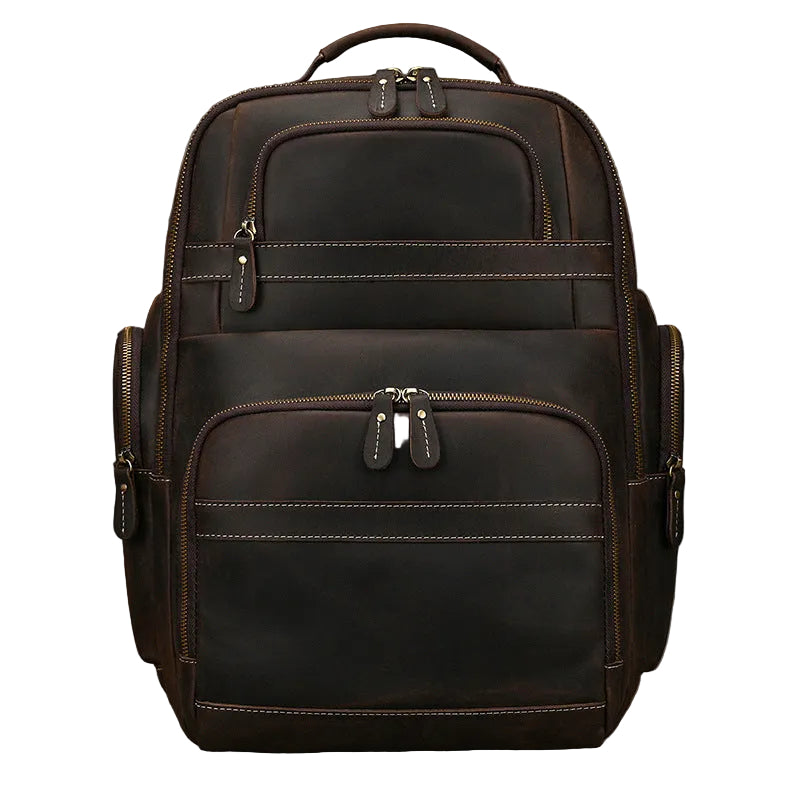 A dark brown distressed leather backpack with multiple zippered compartments and contrast stitching, shown against a neutral gray background.