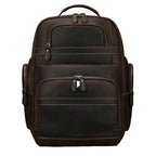 A dark brown distressed leather backpack with multiple zippered compartments and contrast stitching, shown against a neutral gray background.