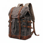 Highland Waxed Canvas Rucksack in dark grey with brown leather straps and trim — Khal Gold