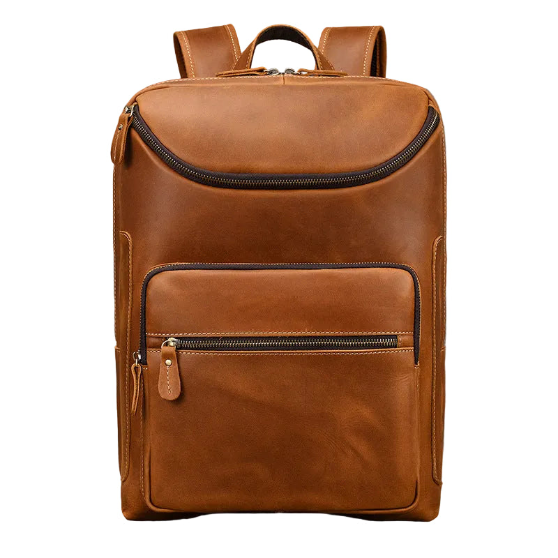 Brown leather backpack on a gray background