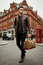 Canvas holdall showing full-length zip and twin leather handles