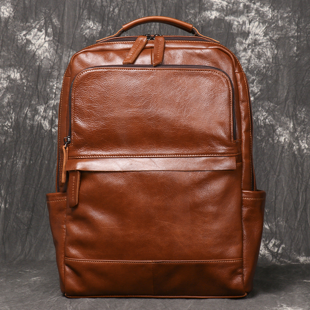 Brown cowhide travel backpack, front view
