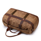 Grey canvas duffel bag, three-quarter view