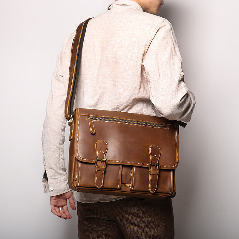 Interior of leather satchel showing A4 document space and zipped pocket