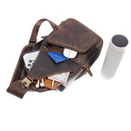 Ranger Leather Sling Bag showing the concealed rear pocket that sits flat against the back — Khal Gold