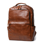 Meridian Leather Travel Backpack in brown cowhide, three-quarter view — Khal Gold