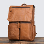 Leather rucksack showing the full-length zip opening