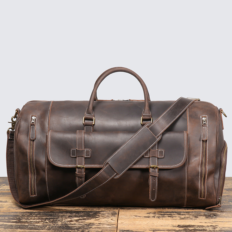 Base feet and stitching detail on the leather weekender
