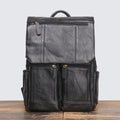 Black distressed leather travel backpack, three-quarter view