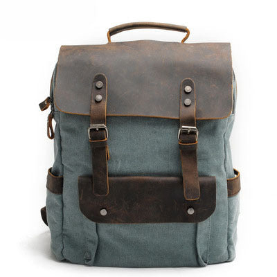 Interior of canvas backpack showing padded laptop section