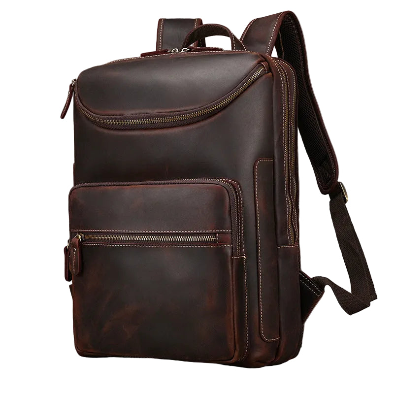 KHAL GOLD Langham leather backpack in dark brown crazy horse leather, three-quarter front view with curved top zip and zipped front pocket
