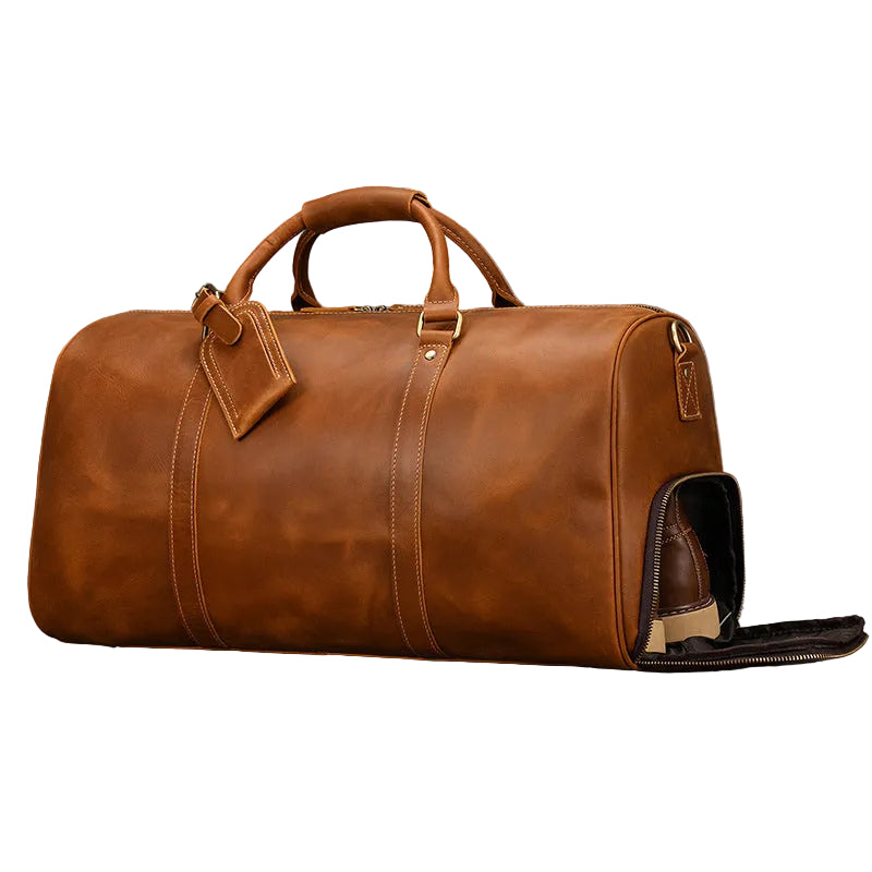 Khal Gold Ambassador weekender in tan crazy horse leather with the external ventilated shoe compartment unzipped