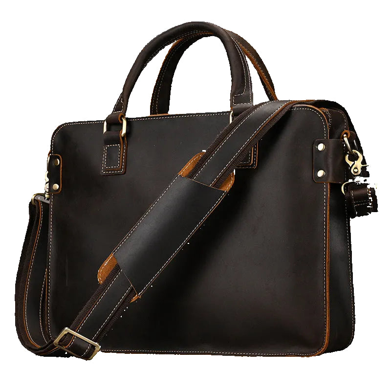 Khal Gold Cornhill leather briefcase in dark brown crazy horse leather, three-quarter view with detachable shoulder strap