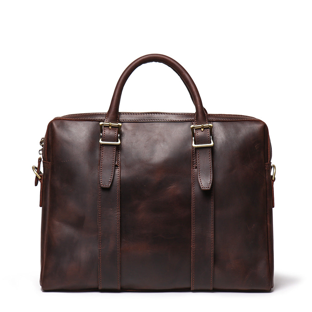 Khal Gold Gresham leather briefcase in dark brown leather, front view with buckle-front pockets