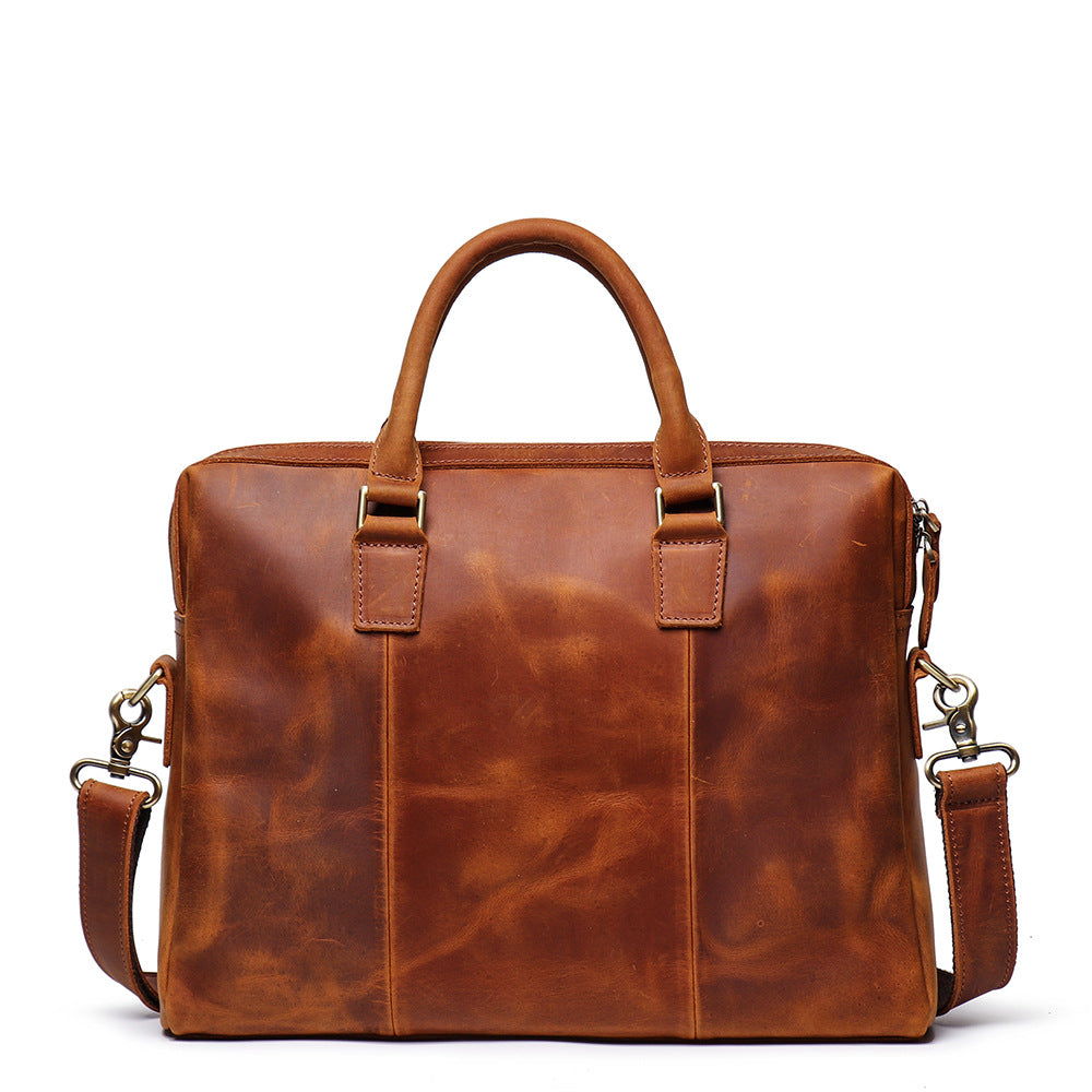 Khal Gold Gresham leather briefcase in tan crazy horse leather, back view with detachable shoulder strap