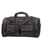 Khal Gold Windsor leather holdall in black crazy horse leather, front view with buckled end pockets and detachable shoulder strap