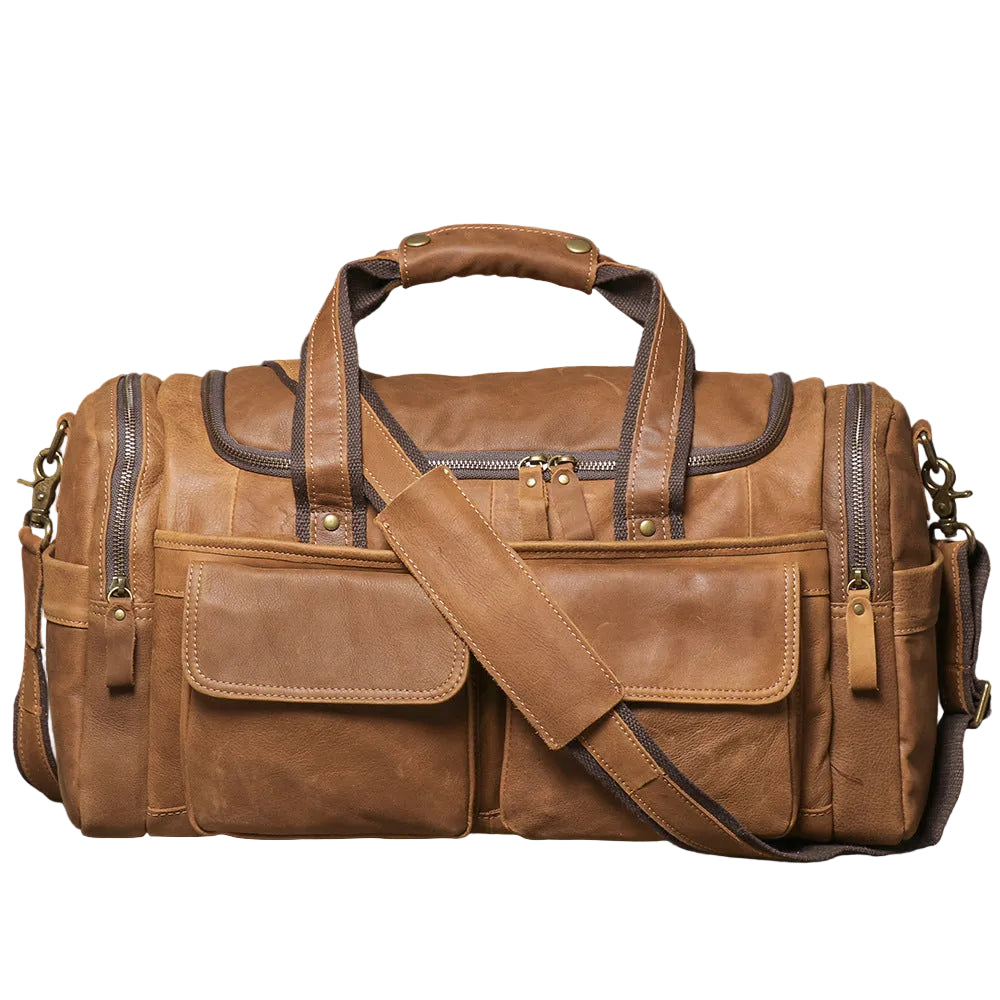 Khal Gold Windsor leather holdall in tan crazy horse leather, front view with buckled end pockets and detachable shoulder strap